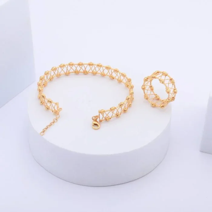 ⁦سوار وخاتم مميزان من عيار 21 قيراطًا⁩ - الصورة ⁦1⁩